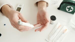 https://www.pexels.com/photo/a-person-pricking-his-hand-6823507/A person with diabetes testing their blood sugar using a finger prick method